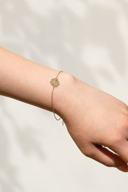 Pulsera 10 kilates dije trébol de cuatro hojas con zirconias.