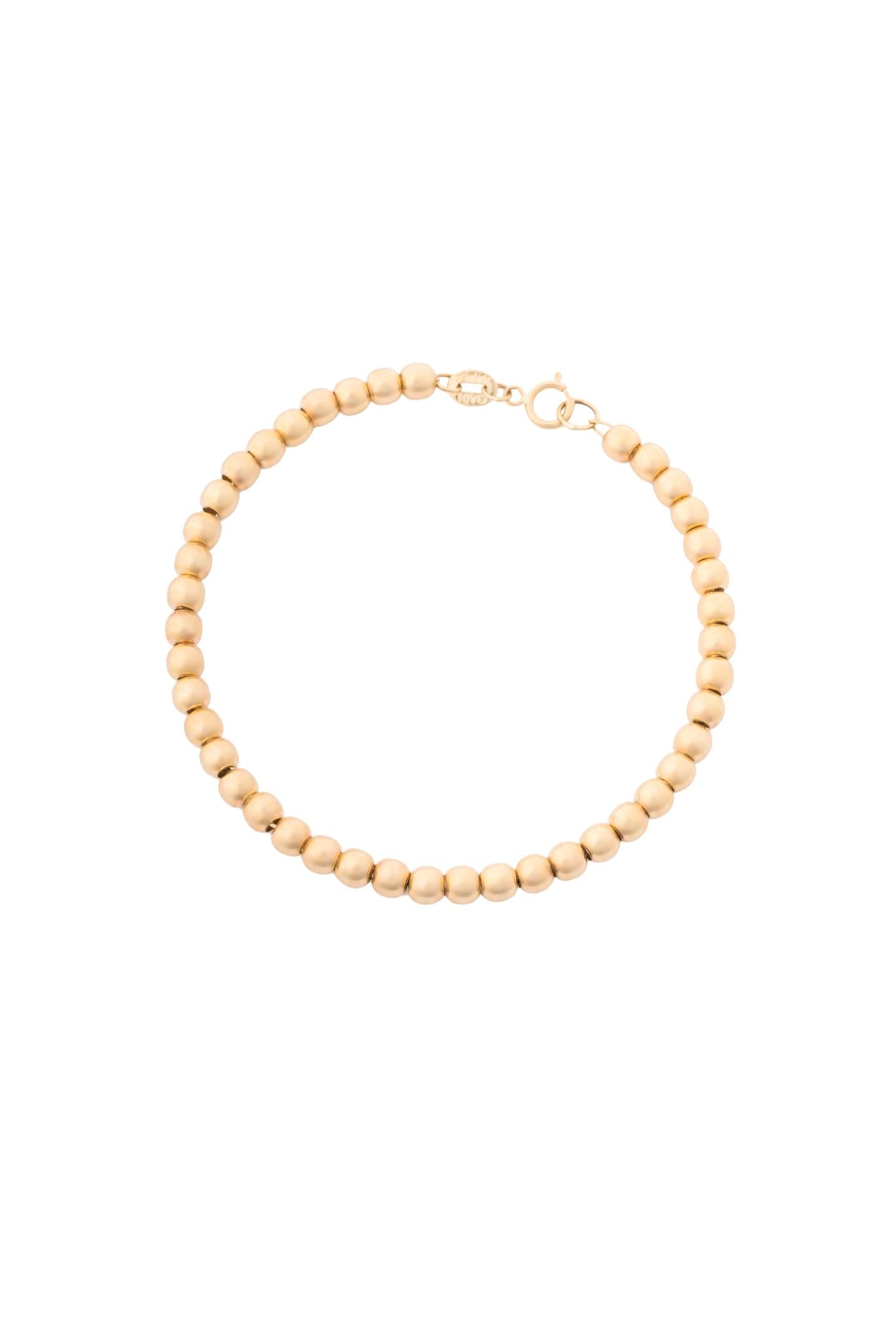 Pulsera 10K con bolitas lisas chicas..png