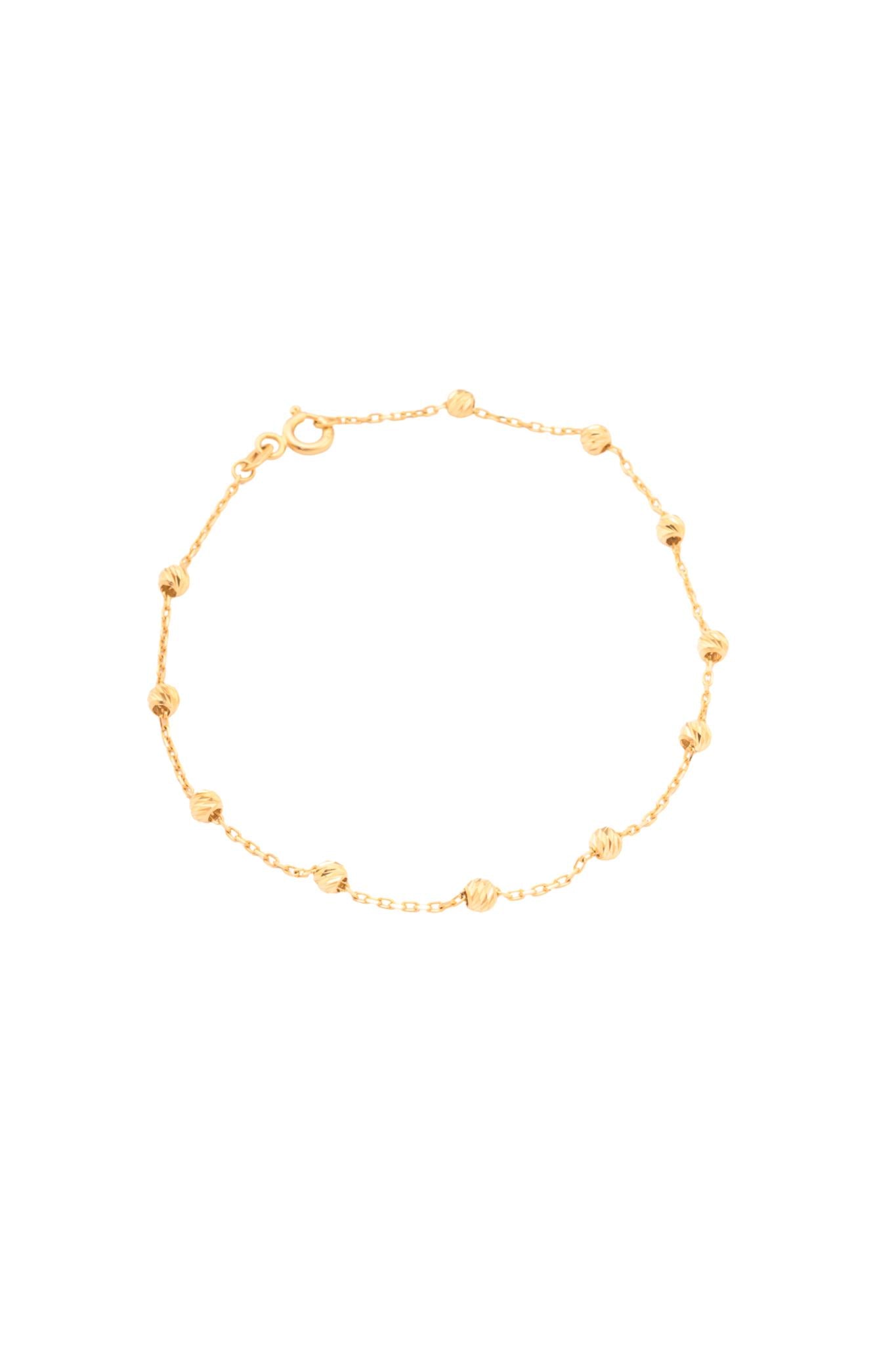 Pulsera 10 kilates bolitas doradas estilo diamantado..png