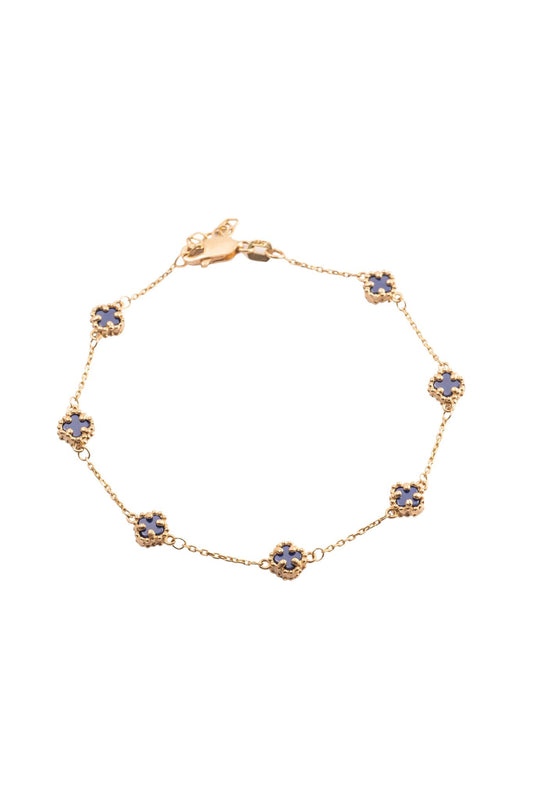 Pulsera 10 kilates con flores minis de cuatro pétalos azules..png