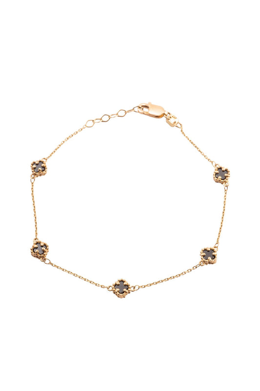 Pulsera 10 kilates con flores minis de cuatro pétalos negros..png