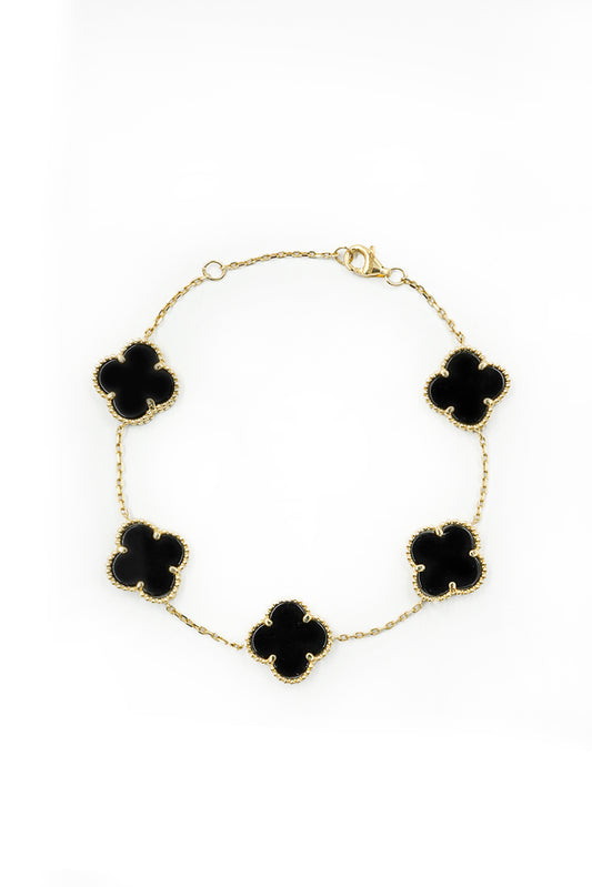 Pulsera 10 kilates dijes flor de cuatro pétalos negro onix grandes..png