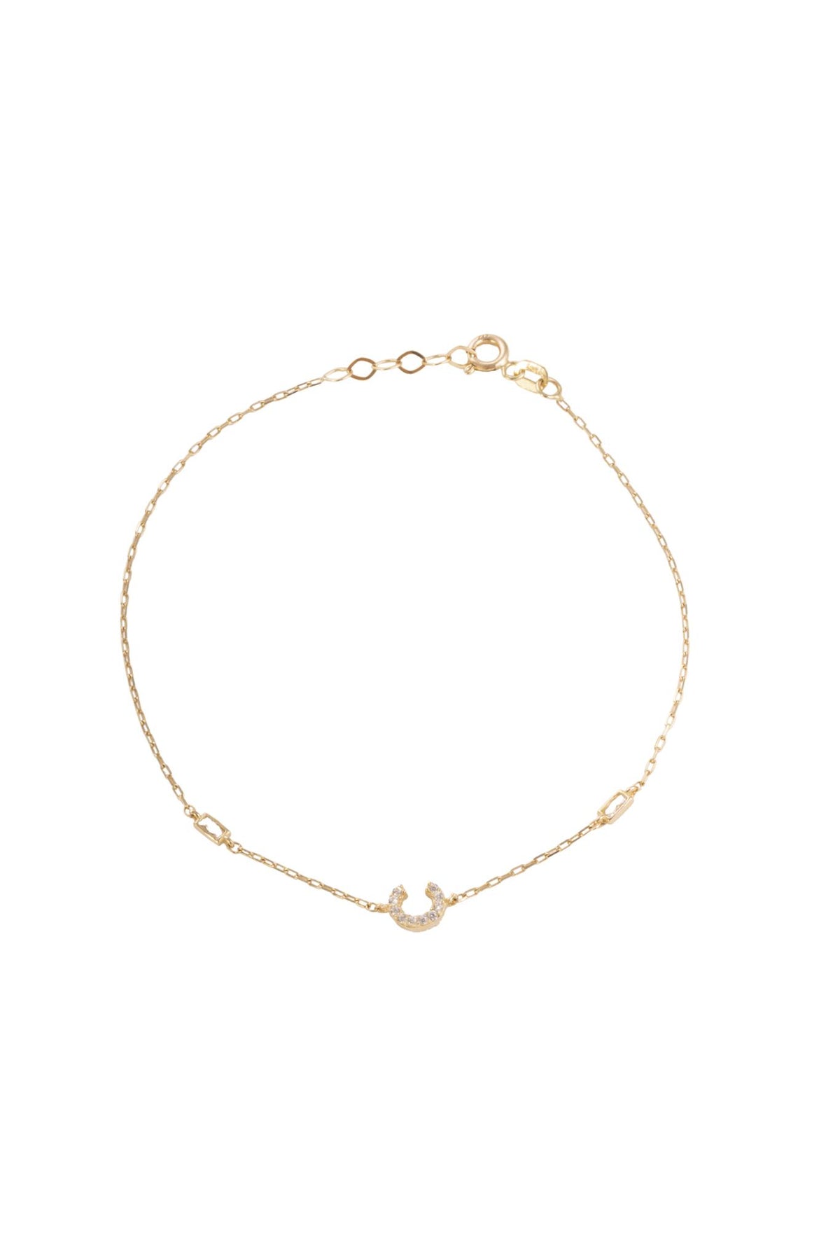 Pulsera 10 kilates, inicial "C" de zirconias y laterales con dos zirconias rectangulares biseladas..png