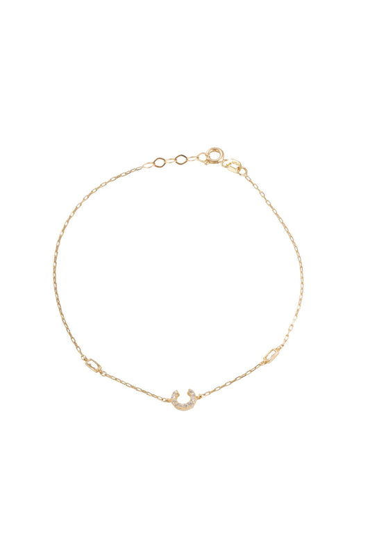 Pulsera 10 kilates, inicial "C" de zirconias y laterales con dos zirconias rectangulares biseladas..png