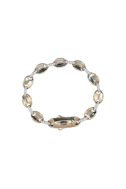 Pulsera 10 kilates tejido botones gucci lisos y separación asa con zirconias..png
