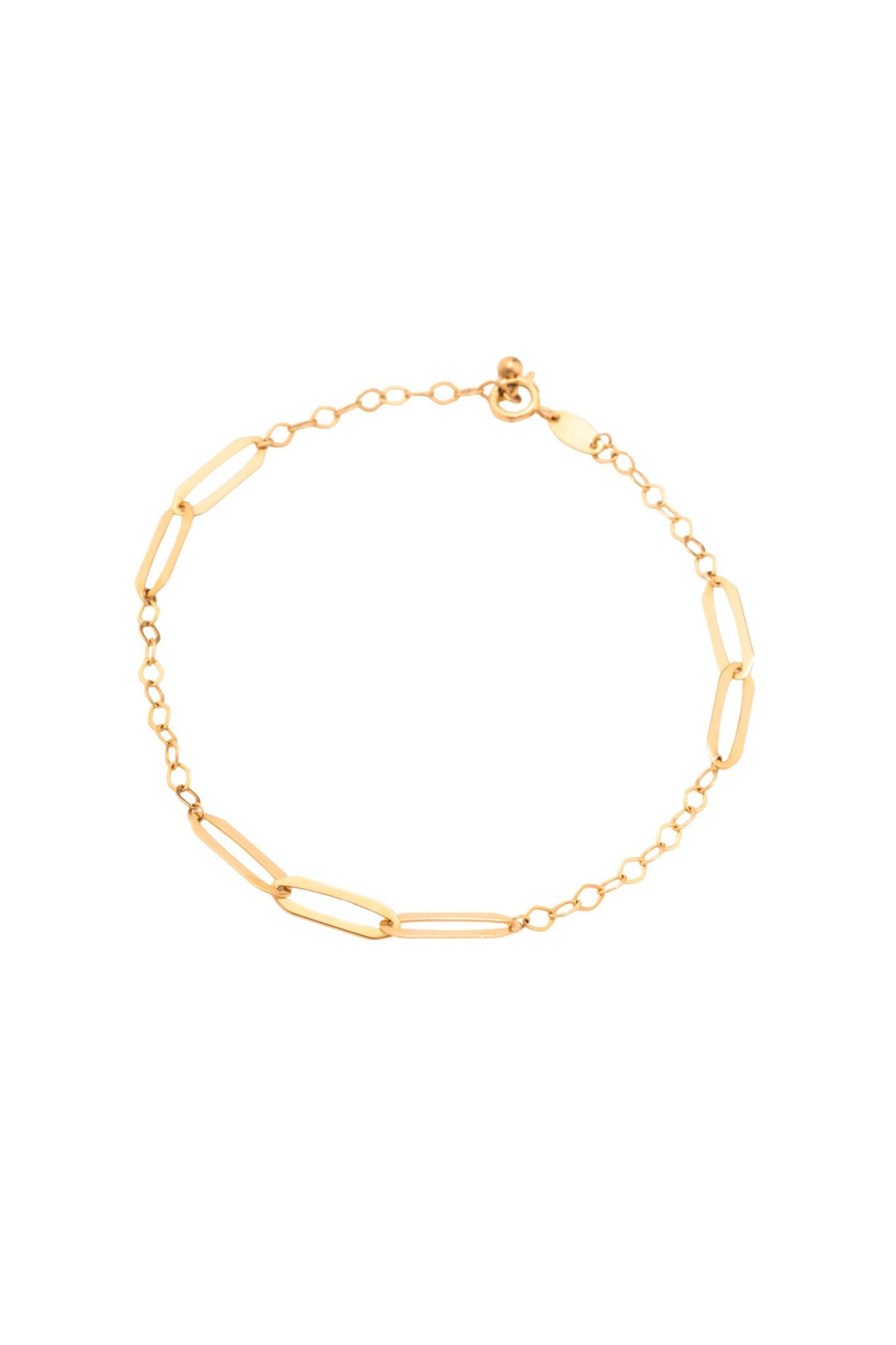 Pulsera 10 kilates una circular, silueta de óvalo liso..png