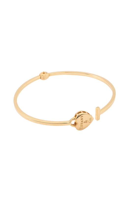 Pulsera aro de oro sólido en 10 kilates con corazón con grabado y T al finalizar..png