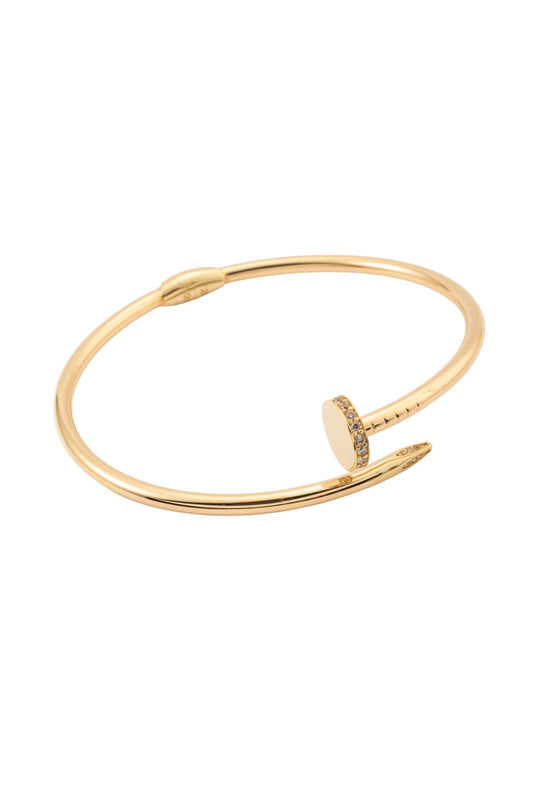 Pulsera aro de oro sólido en 10 kilates con forma de clavo liso orillas zirconias..png
