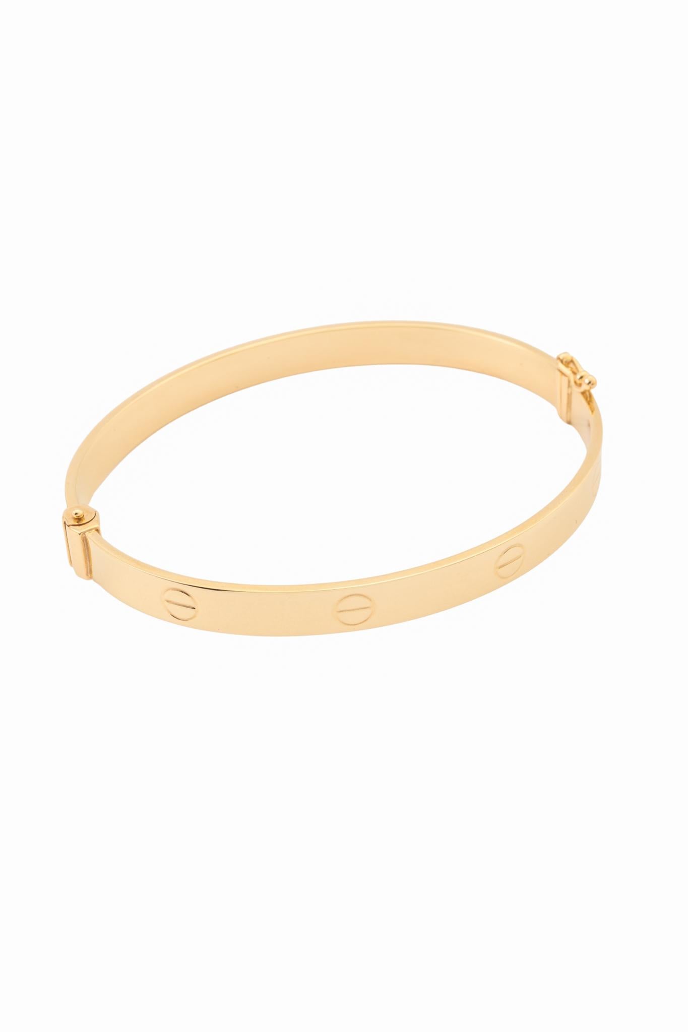 Pulsera aro de oro sólido en 10 kilates con formas de tornillos lisos chico..png