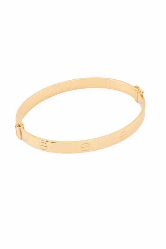 Pulsera aro de oro sólido en 10 kilates con formas de tornillos lisos chico..png
