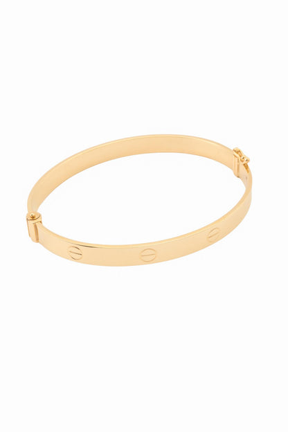 Pulsera aro de oro sólido en 10 kilates con formas de tornillos lisos grande..png