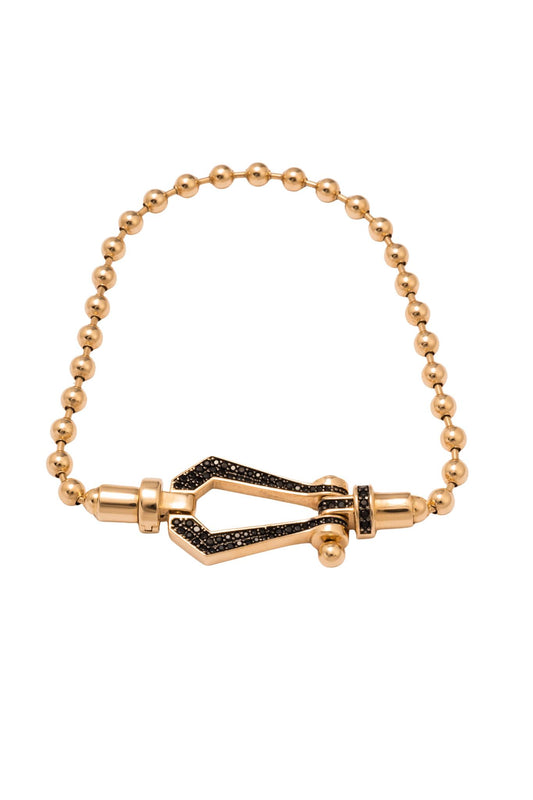 Pulsera caballero de oro sólido en 14 kilates con bolitas lisas y ancla de zirconias negras..png