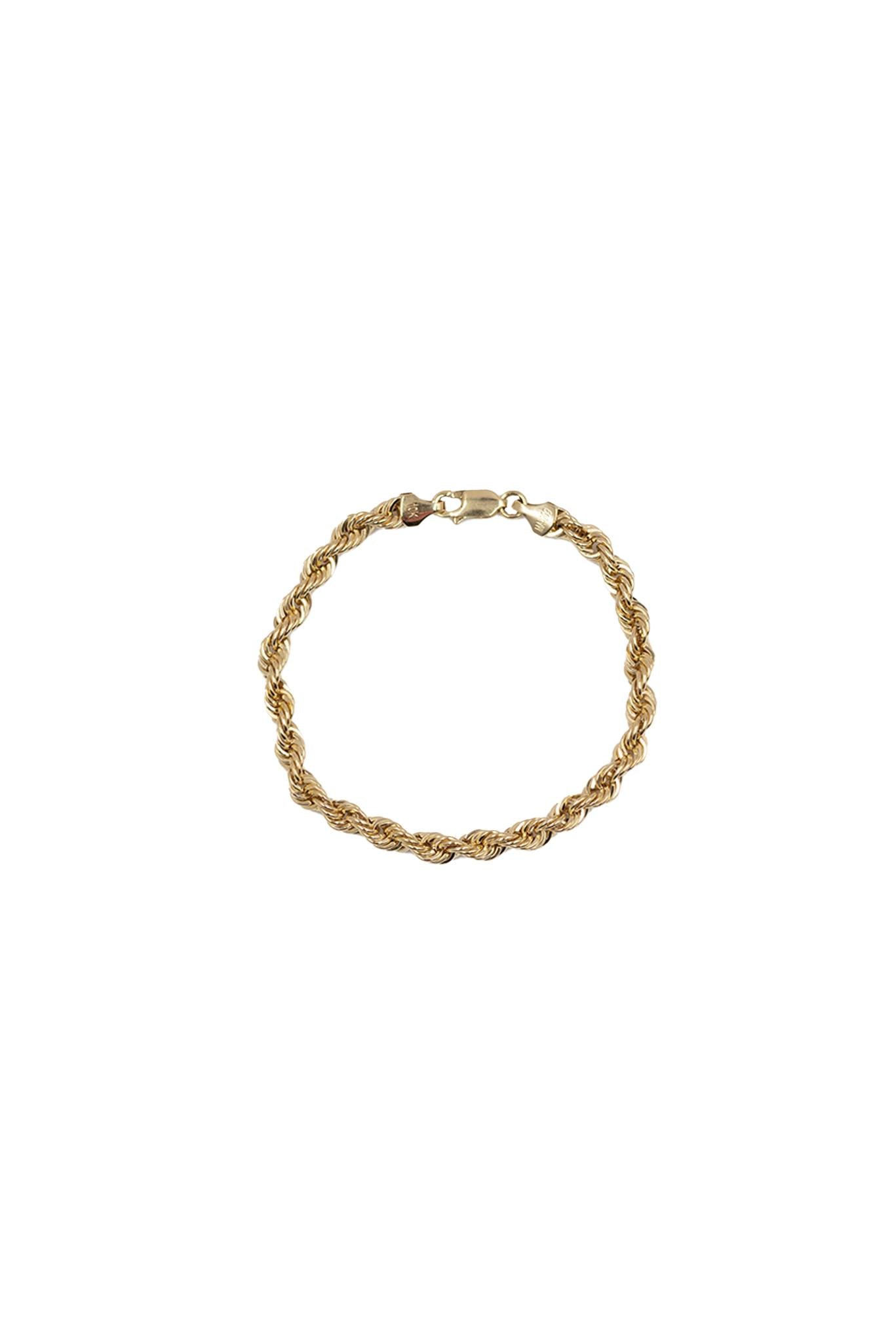 Pulsera de oro sólida en 10 kilates con un estilo torzal .png