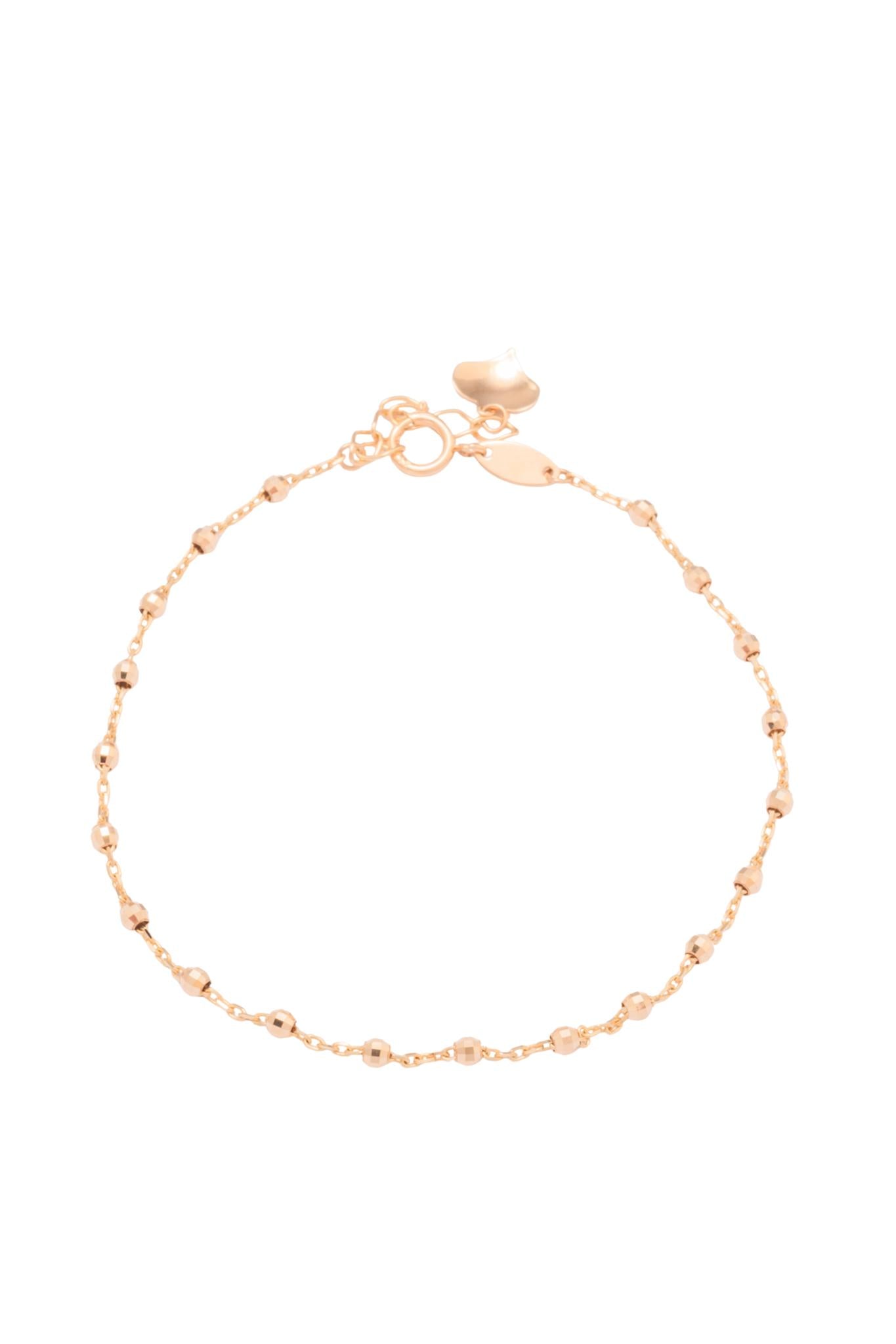 Pulsera de oro sólido en 10 kilates con bolitas chicas en estilo diamantado y al finalizar un corazón .png