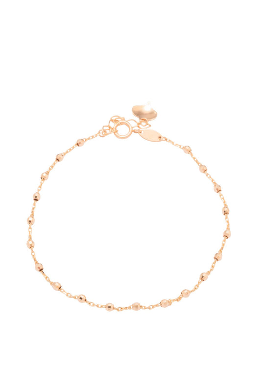 Pulsera de oro sólido en 10 kilates con bolitas chicas en estilo diamantado y al finalizar un corazón .png