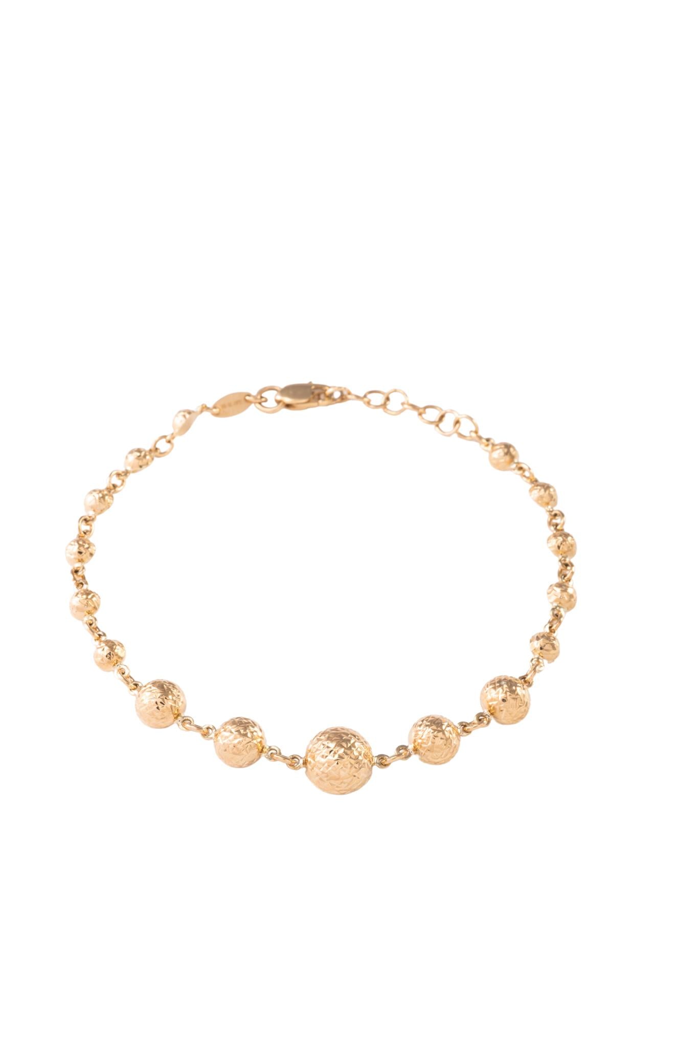 Pulsera de oro sólido en 10 kilates con bolitas diamantadas decrecientes..png