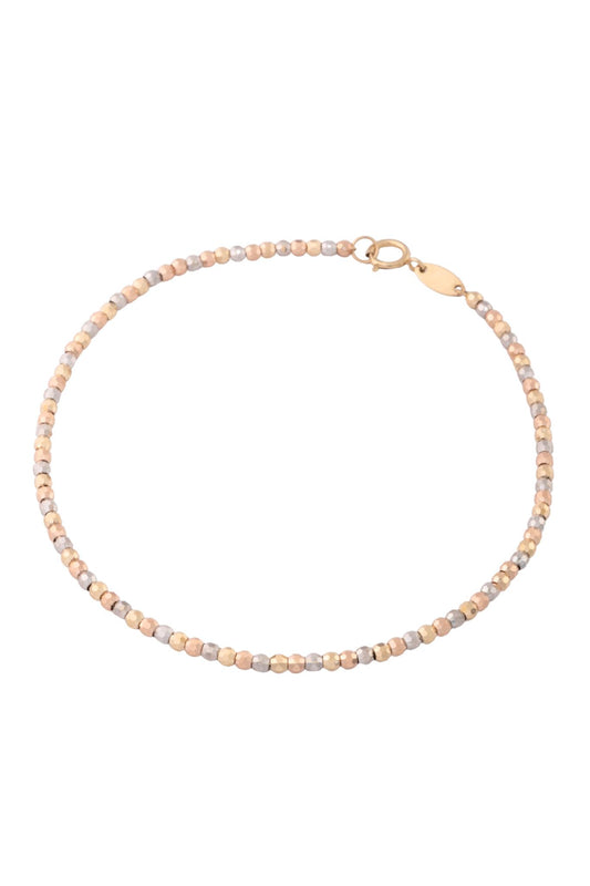 Pulsera de oro sólido en 10 kilates con bolitas diamantadas en oro florentino pegadas..png