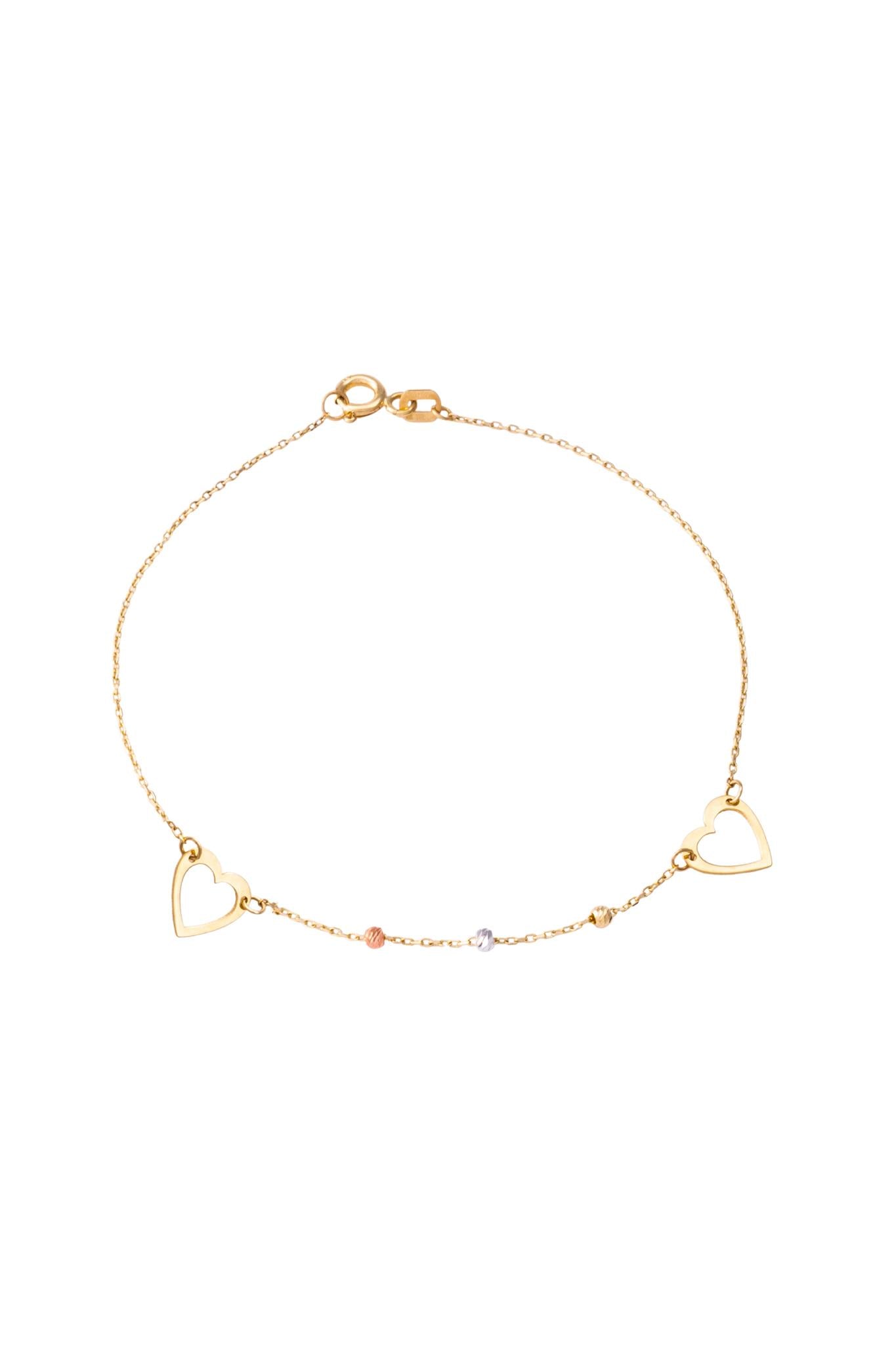 Pulsera de oro sólido en 10 kilates con bolitas diamantadas oro florentino y dijes de corazón hueco..png