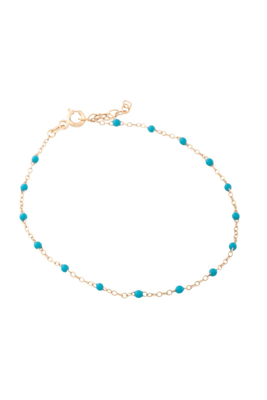Pulsera de oro sólido en 10 kilates con bolitas esmaltadas azules..png