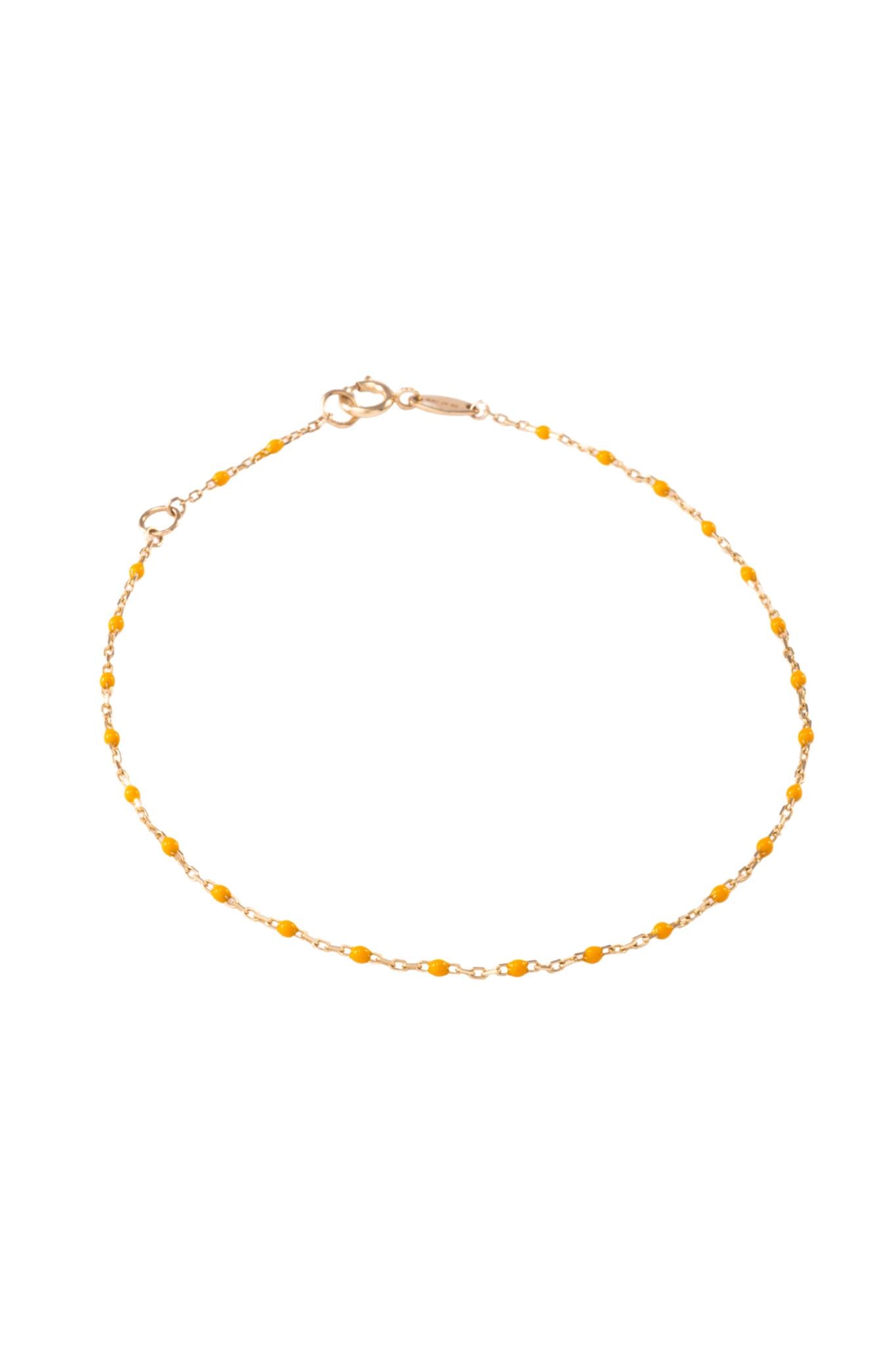 Pulsera de oro sólido en 10 kilates con bolitas esmaltadas naranja claro..png