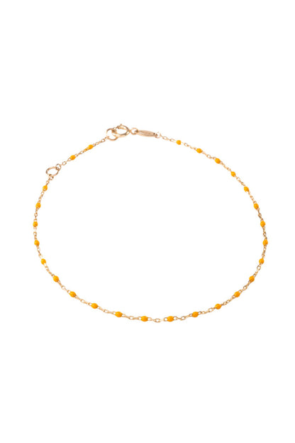 Pulsera de oro sólido en 10 kilates con bolitas esmaltadas naranja claro..png