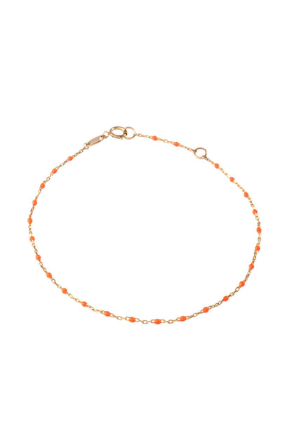 Pulsera de oro sólido en 10 kilates con bolitas esmaltadas naranja fosforecente..png