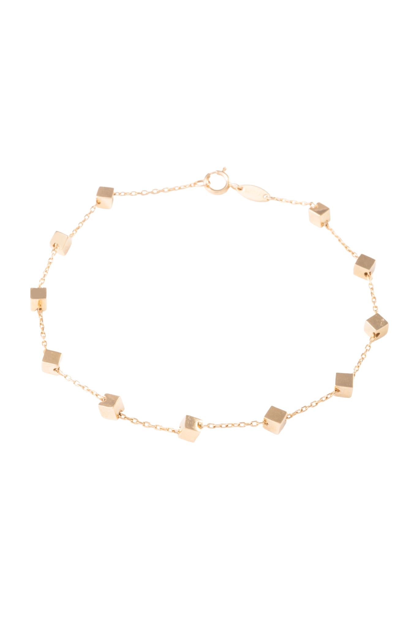Pulsera de oro sólido en 10 kilates con dijes de cubos lisos..png