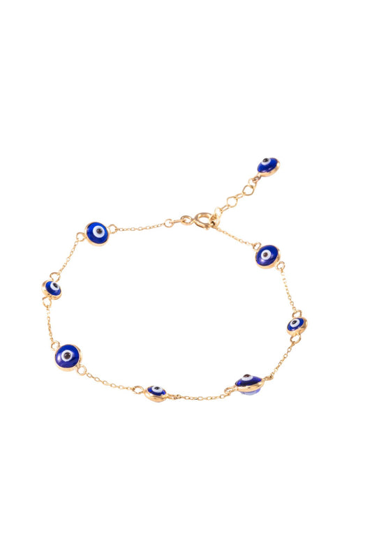 Pulsera de oro sólido en 10 kilates con dijes de ojos azules biselados .png