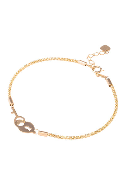 Pulsera de oro sólido en 10 kilates con eslabón de panza de víbora y centro dije de corazón candado y llave..png