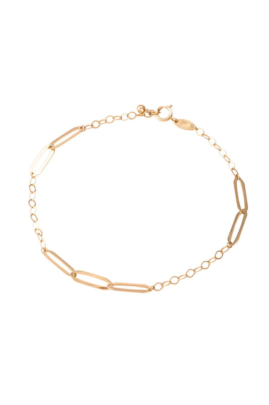 Pulsera de oro sólido en 10 kilates con eslabones ovalados placa lisa..png