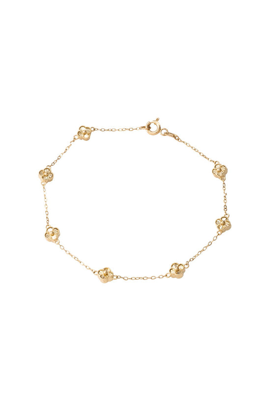 Pulsera de oro sólido en 10 kilates con flores de cuatro pétalos minis diamantadas..png