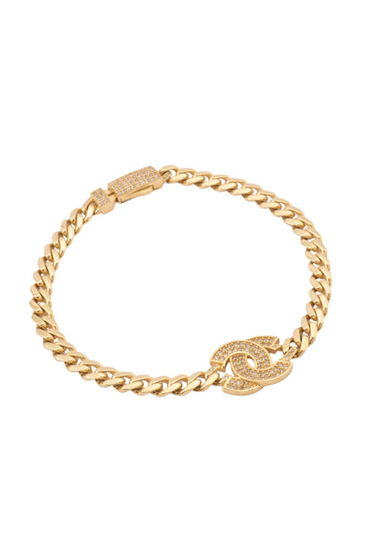 Pulsera de oro sólido en 10 kilates con tejido cubano y centro CC de zirconias biseladas..png