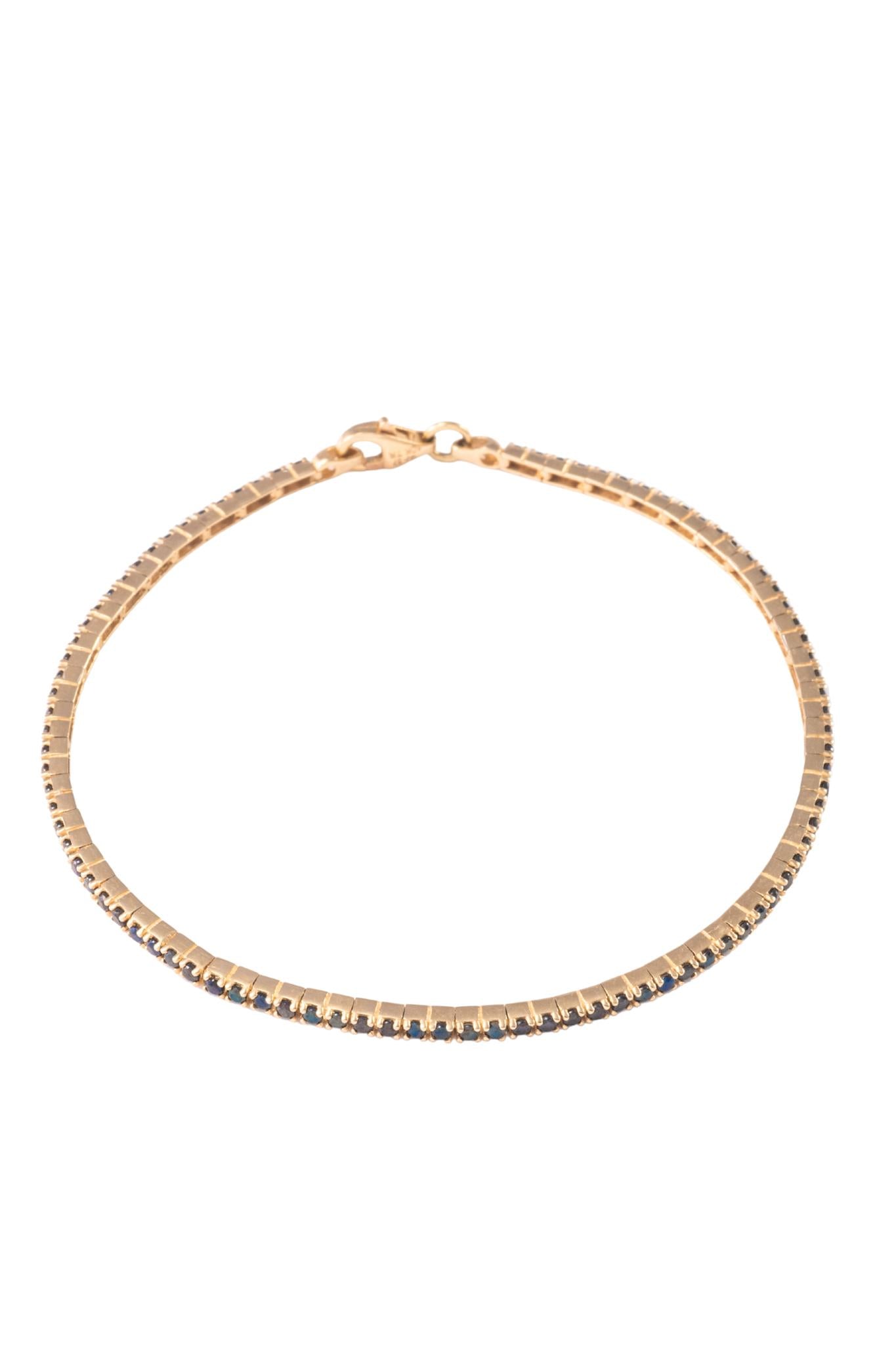 Pulsera de oro sólido en 10 kilates con tejido tenis zirconias negras..png