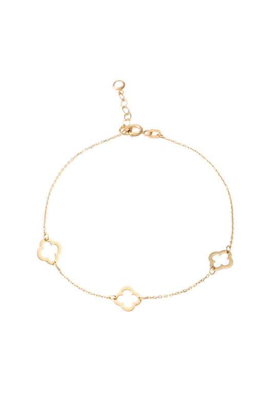 Pulsera de oro sólido en 10 kilates con tres flores de cuatro pétalos contorno lisos..png