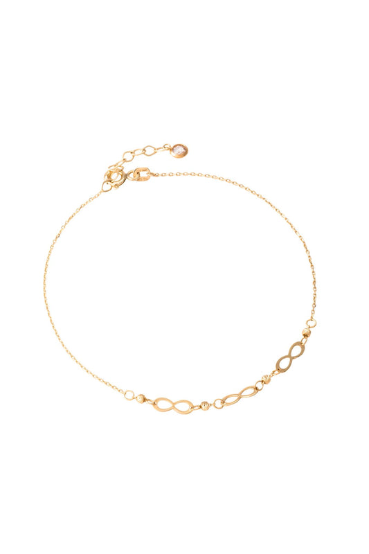 Pulsera de oro sólido en 10 kilates con tres infinitos lisos y bolitas diamantadas..png