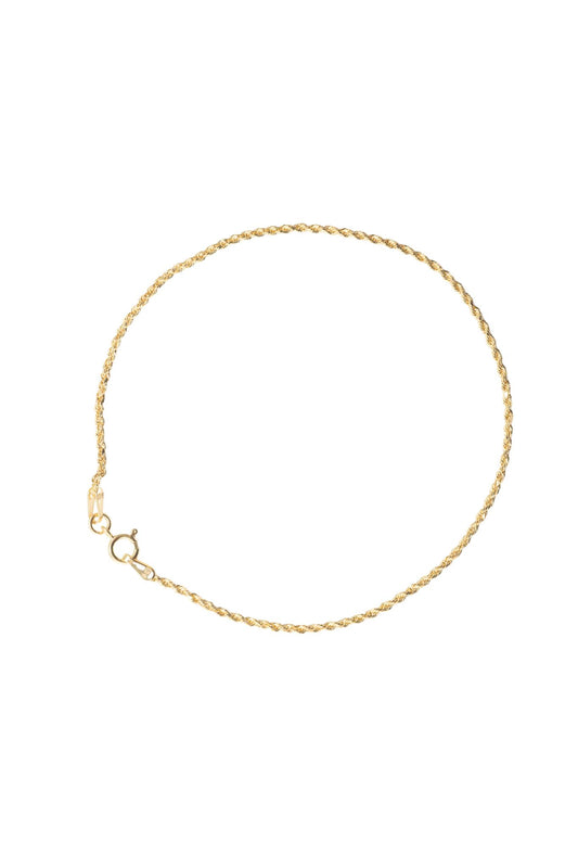 Pulsera de oro solido en 10 kilates con un estilo de torzal delgado .png