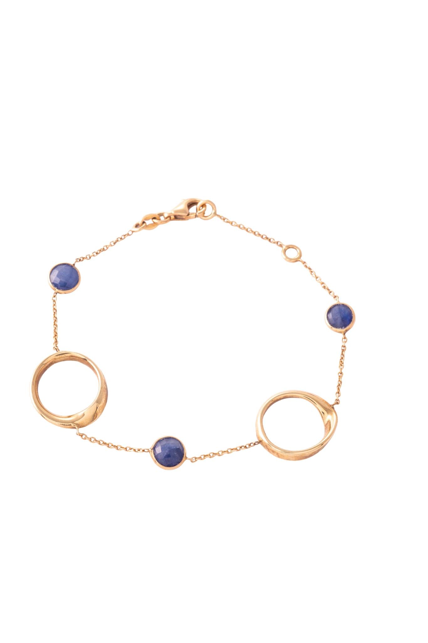 Pulsera de oro sólido en 14 kilates con círculos desiguales en oro amarillo y piedras preciosas biseladas..png