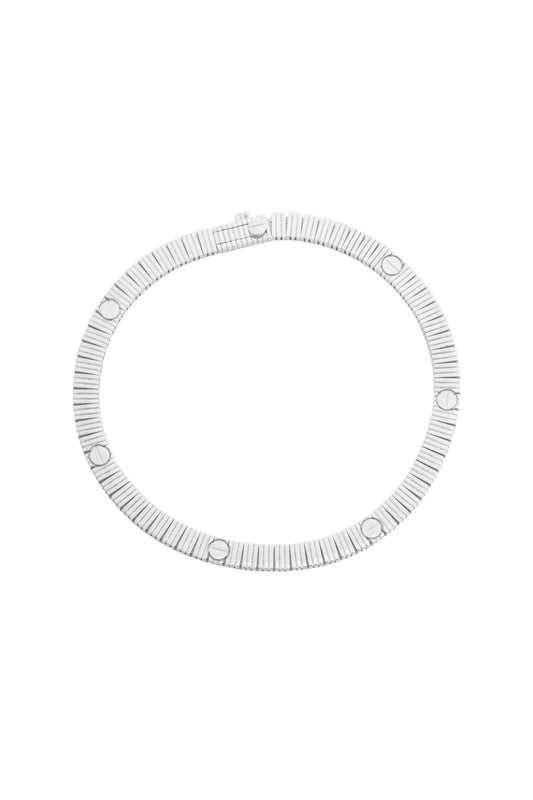 Pulsera de oro sólido en 14 kilates con lineas estilo diamantado con 6 marcas de clavo grueso en oro blanco .png