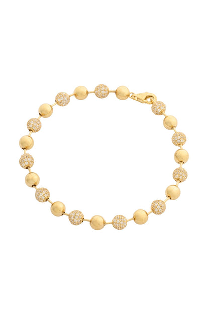Pulsera en 10 kilates con bolas lisas y zirconias intercaladas.png