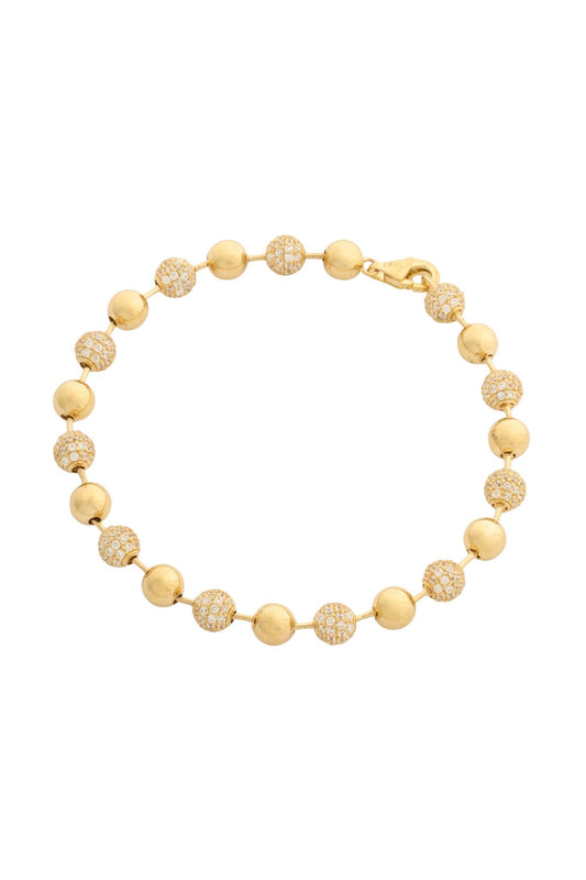 Pulsera en 10 kilates con bolas lisas y zirconias intercaladas.png