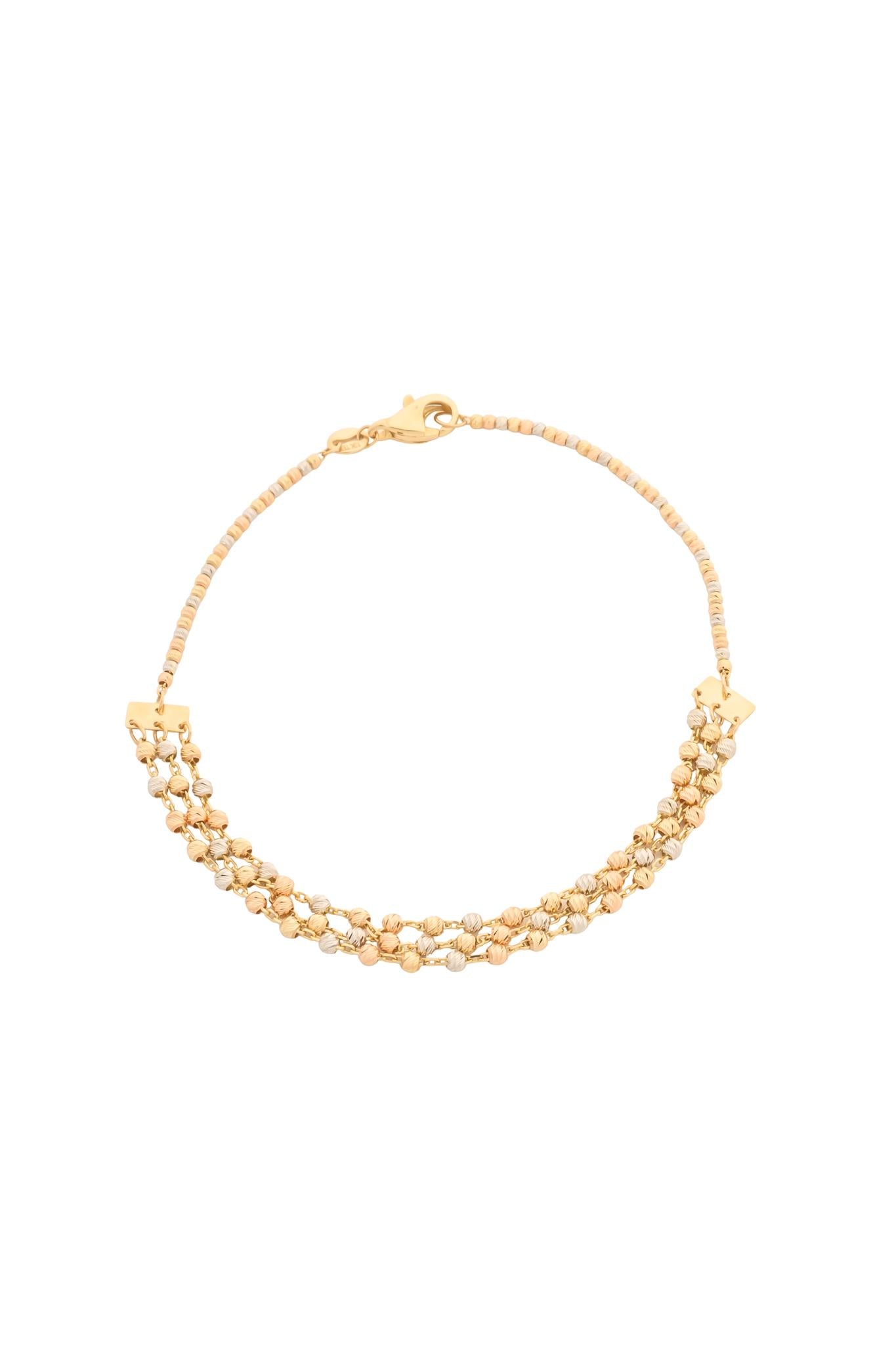 Pulsera en 10 kilates con bolitas florentinas y tres filas.png