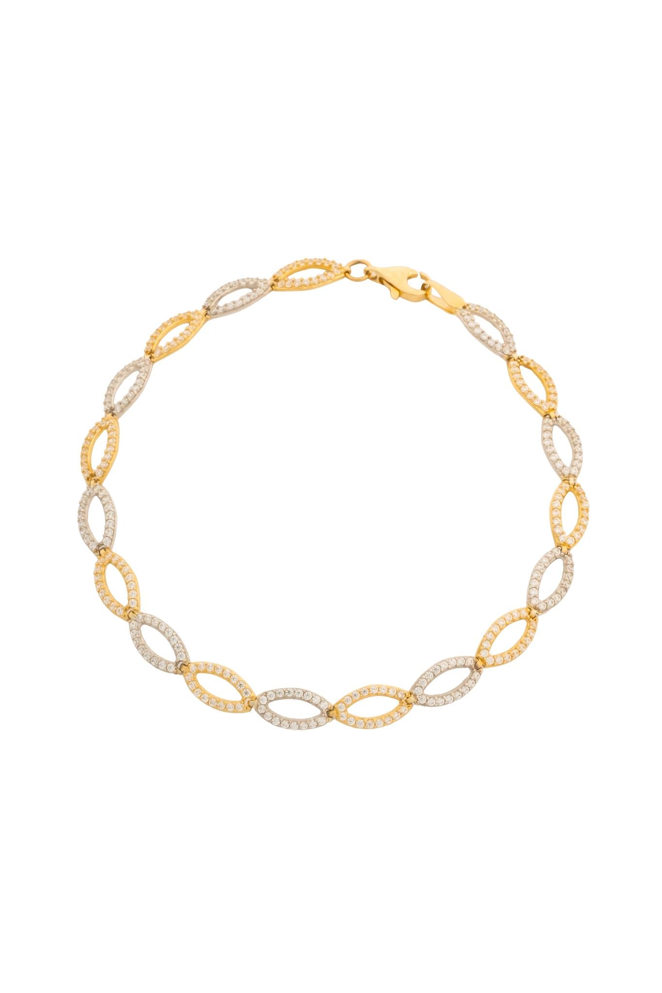 Pulsera en 10 kilates con semillas huecas y zirconias.png