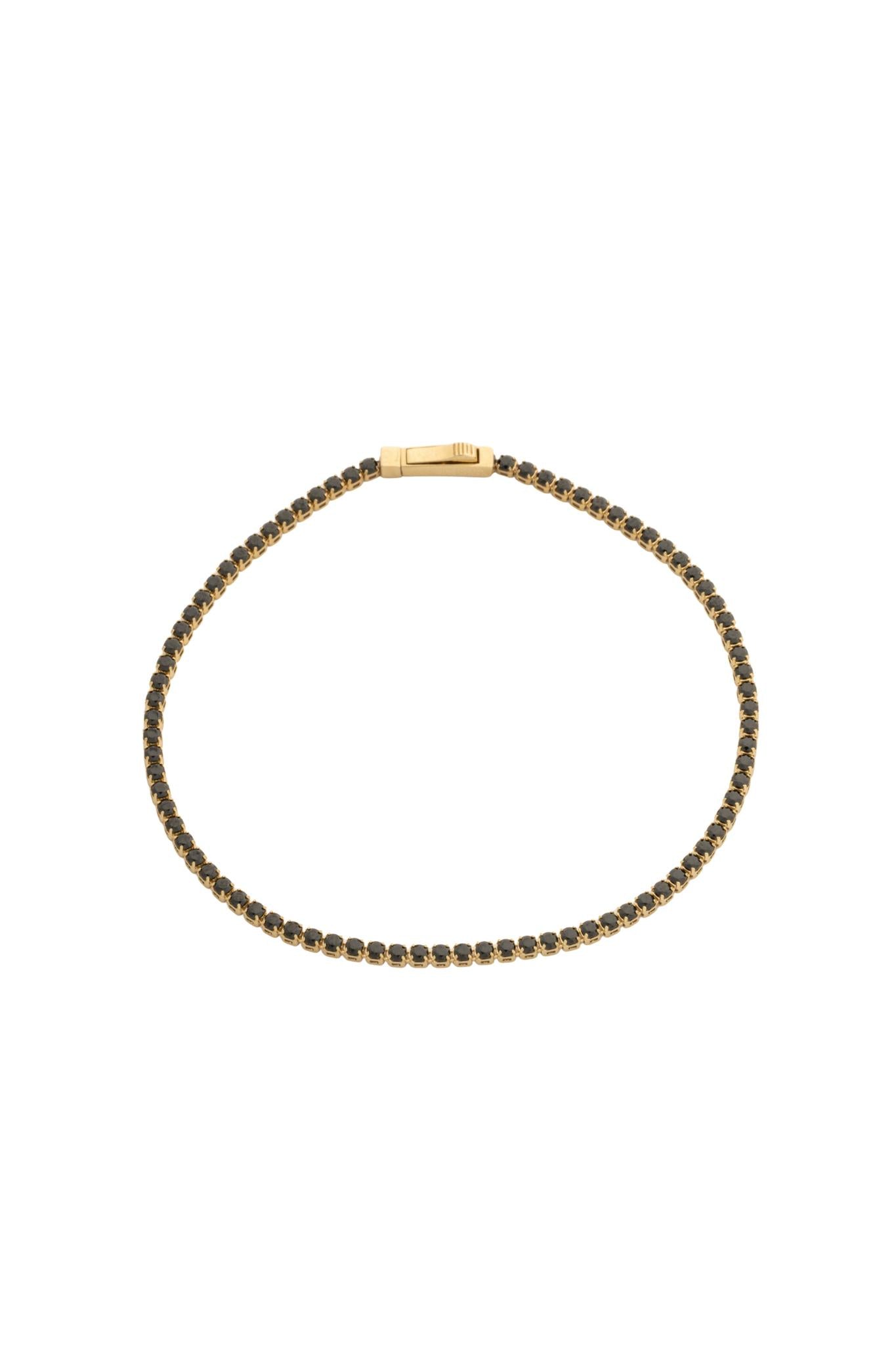 Pulsera en 10 kilates tipo tenis con zirconias negras.png
