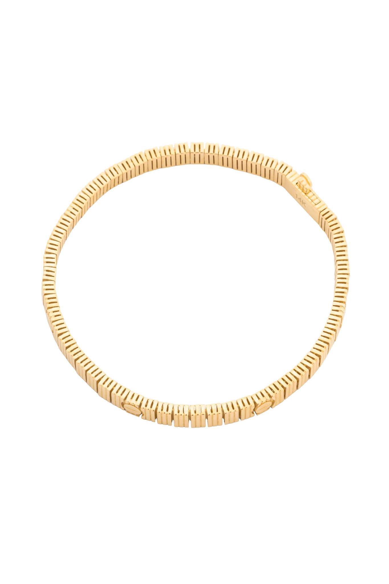 Pulsera en 14 kilates con rayas y marcas de tornillo.png