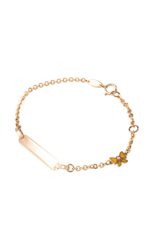 Pulsera esclava de oro sólido en 10 kilates con moño esmaltado y placa lisa al centro..png