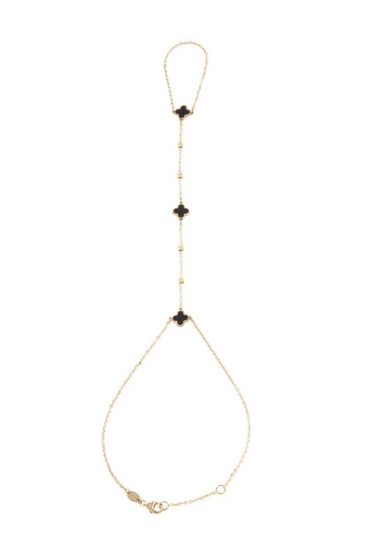 Pulsera handchain 10 kilates flores negras y bolitas..png