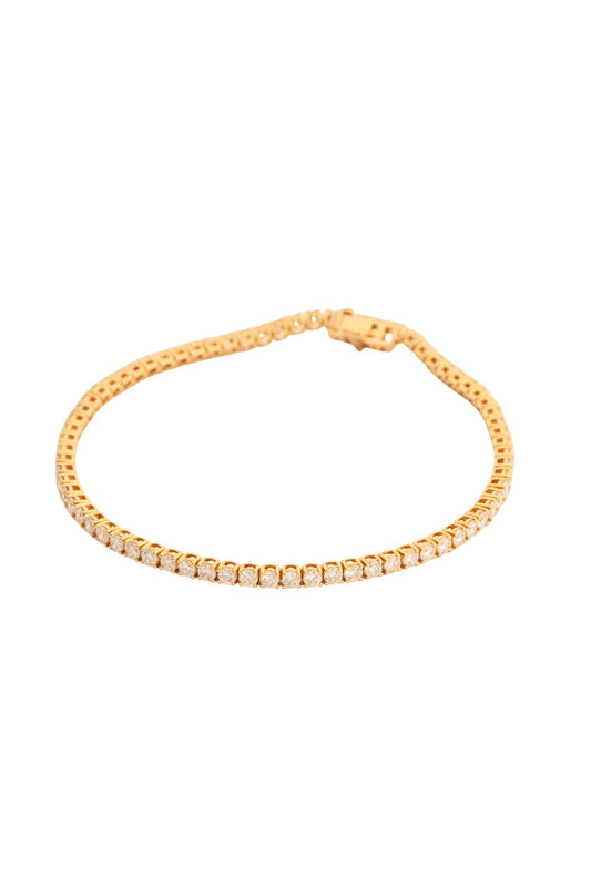 Pulsera tenis completa 14K con diamantes de 3 puntos montados en oro amarillo..png
