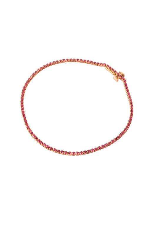 Pulsera tenis de oro sólido en 14 kilates con rubies de 1.50 montados sobre oro amarillo..png