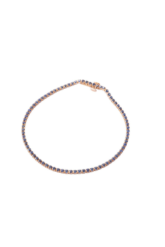 Pulsera tenis de oro sólido en 14 kilates con zafiros de 1.75 montados sobre oro amarillo..png