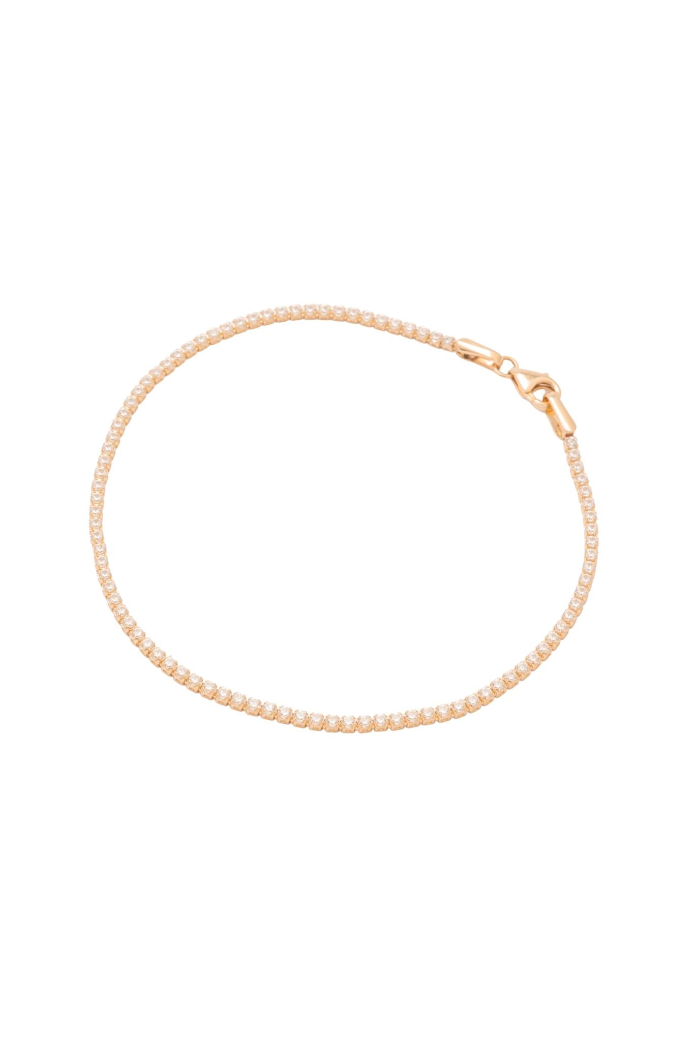 Pulsera tenis de oro sólido en 14 kilates con zirconias blancas montadas en oro amarillo..png